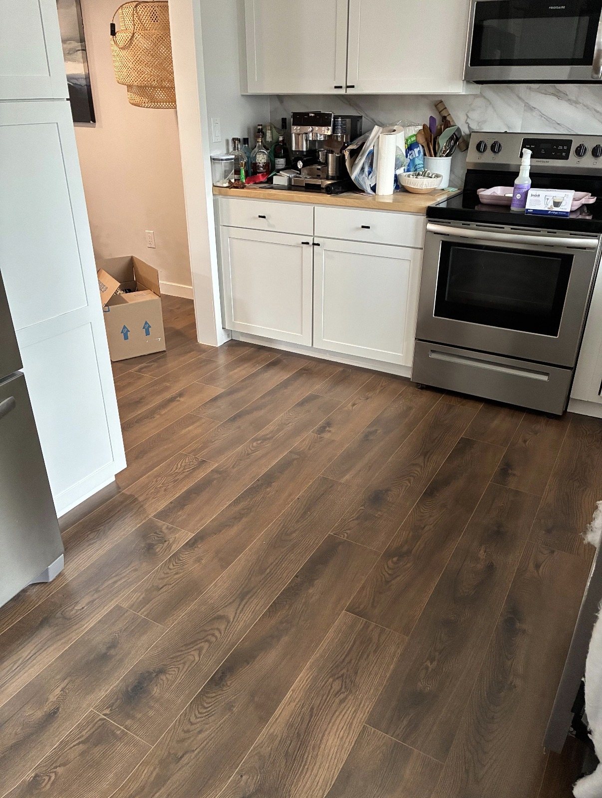 New laminate flooring through the kitchen