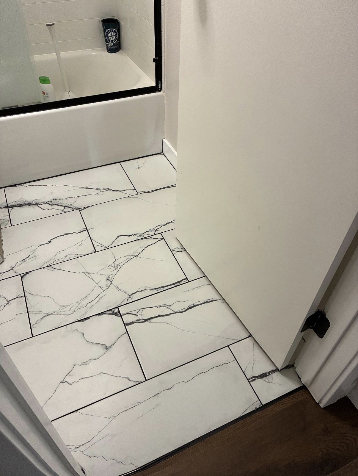 Marble-look bathroom floor tile
